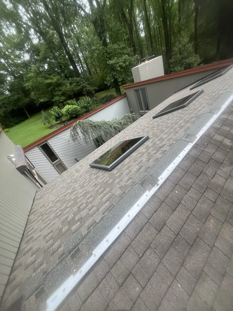 Slide of Elazer Company Roofing & Repairs