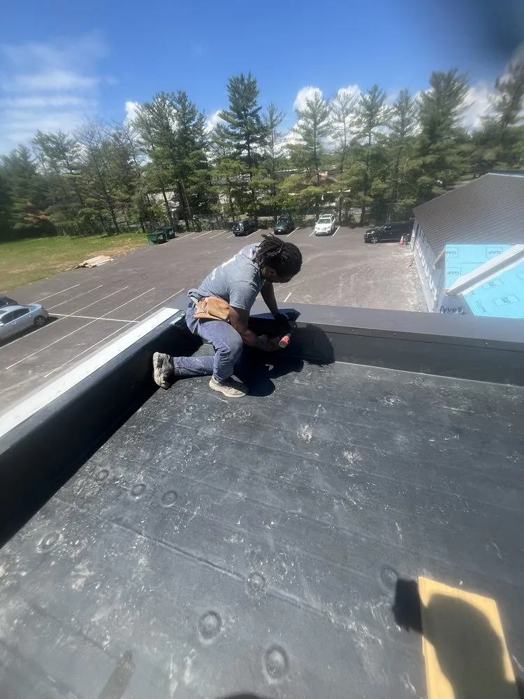 Slide of Elazer Company Roofing & Repairs