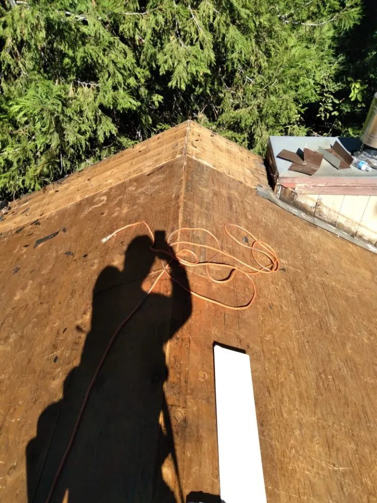 Slide of Eleazars Roofing