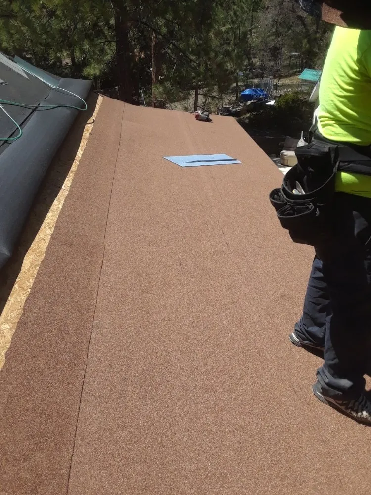 Slide of Eleazars Roofing