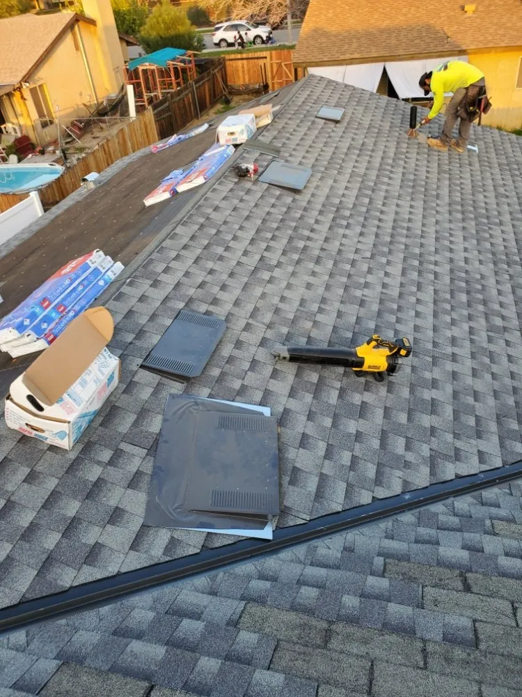 Slide of Eleazars Roofing