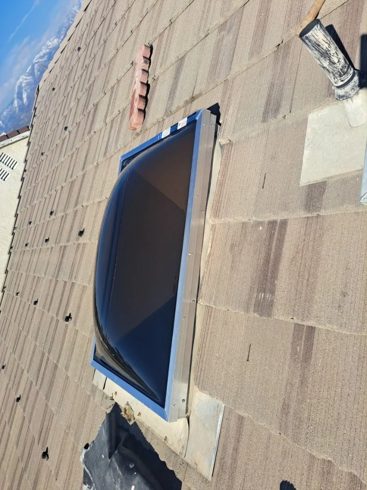 Slide of Eleazars Roofing