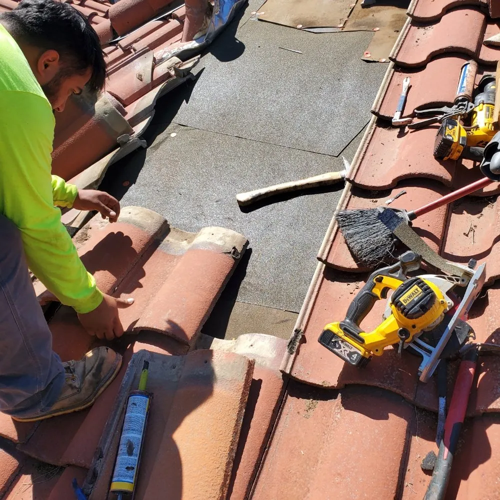 Slide of Eleazars Roofing