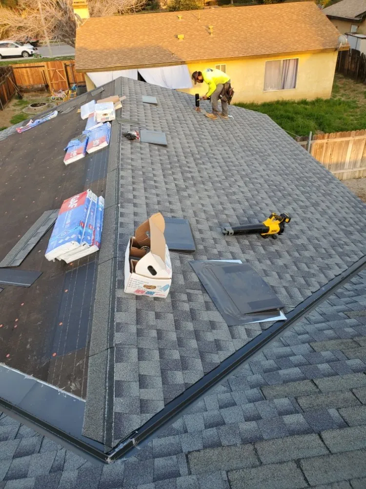 Slide of Eleazars Roofing