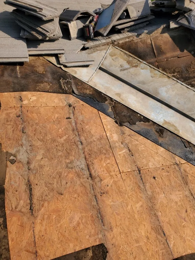 Slide of Eleazars Roofing