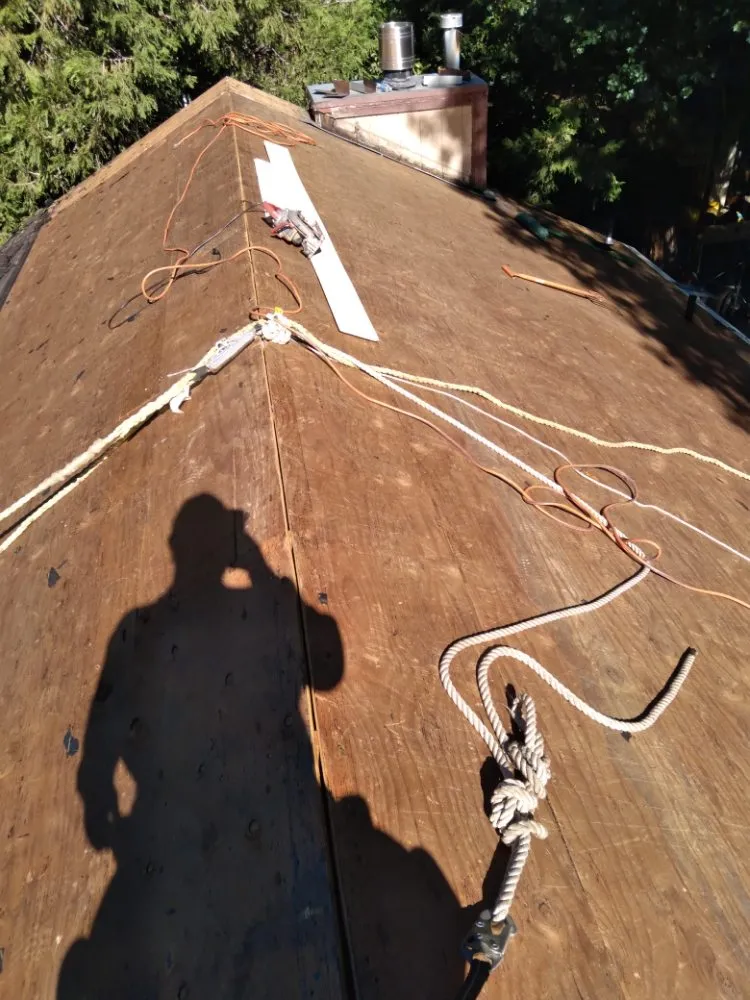 Slide of Eleazars Roofing