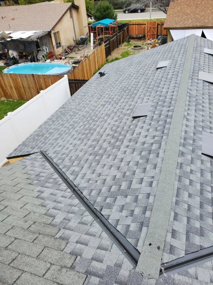 Slide of Eleazars Roofing