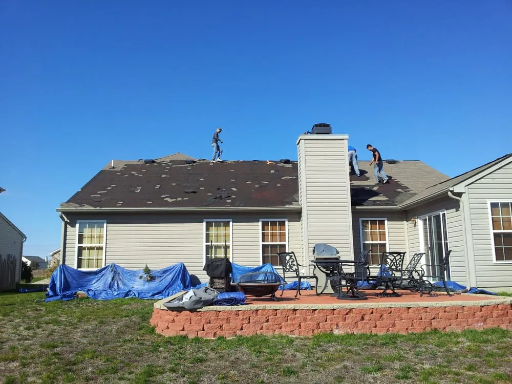 Slide of Election Roofing and Construction