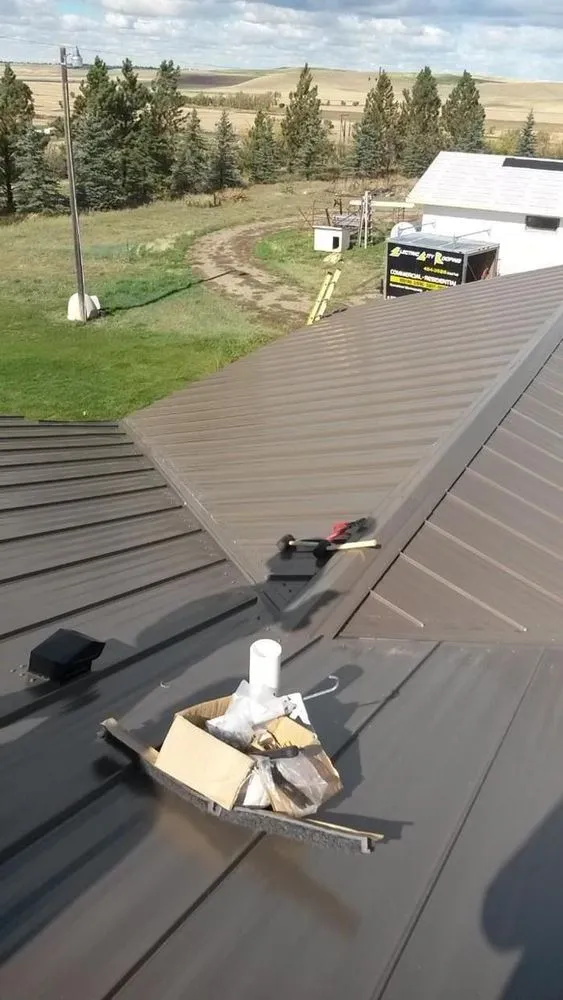 Slide of Electric City Roofing