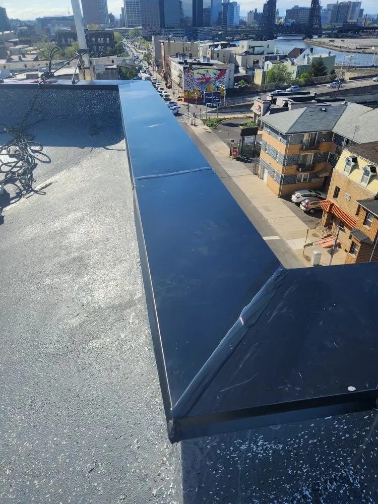 Slide of Elemental Roofing Solutions