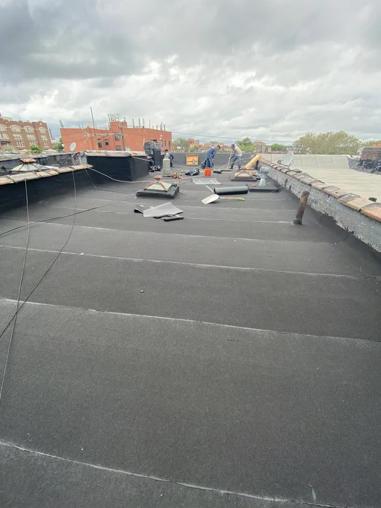 Slide of Elemental Roofing Solutions