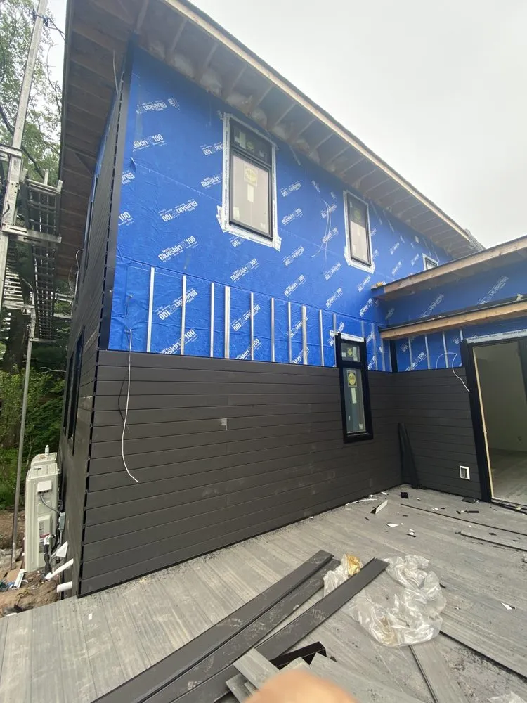 Slide of Elemental Roofing Solutions