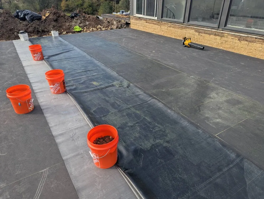 Slide of Elephant Guard Roofing