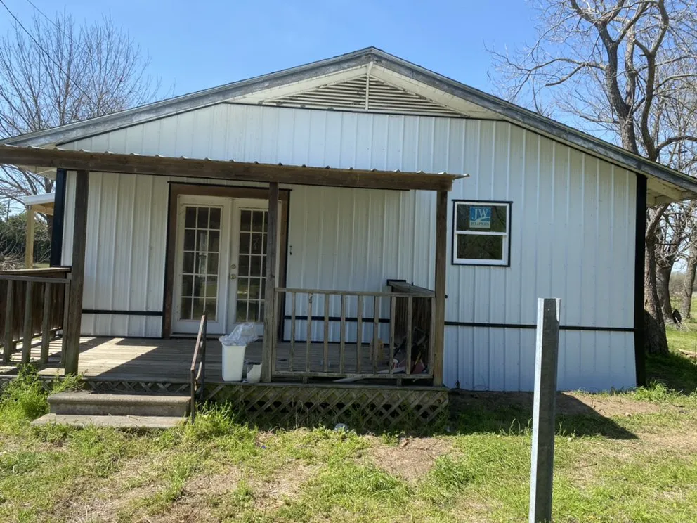 Local residential roofing service with free inspection in Brashear, TX by Elevate Roofing & Builders
