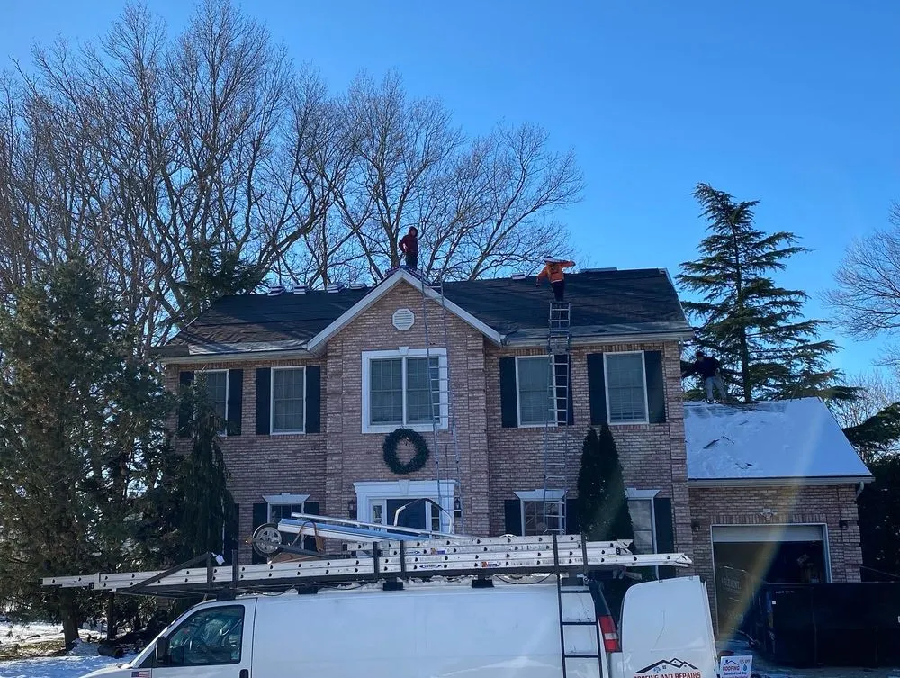 Slide of Eley’s Roofing