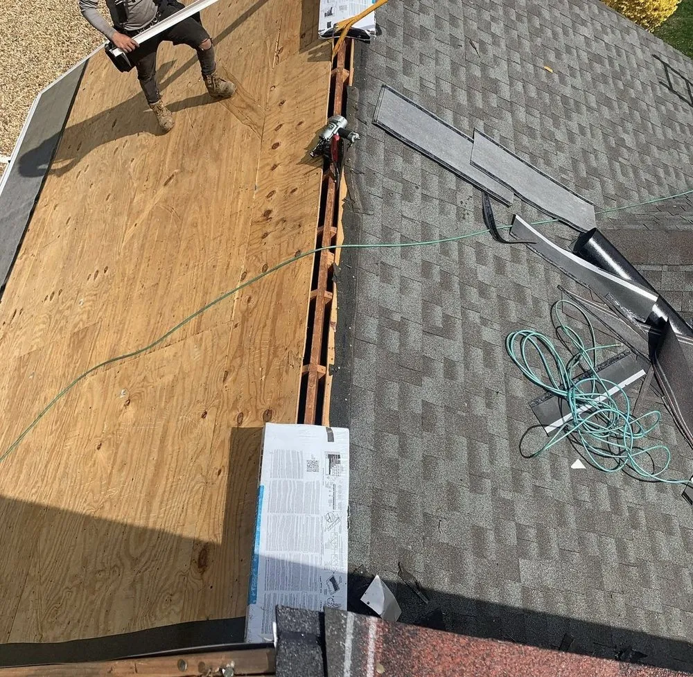 Slide of Eley’s Roofing