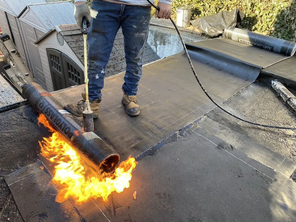 Slide of Eley’s Roofing