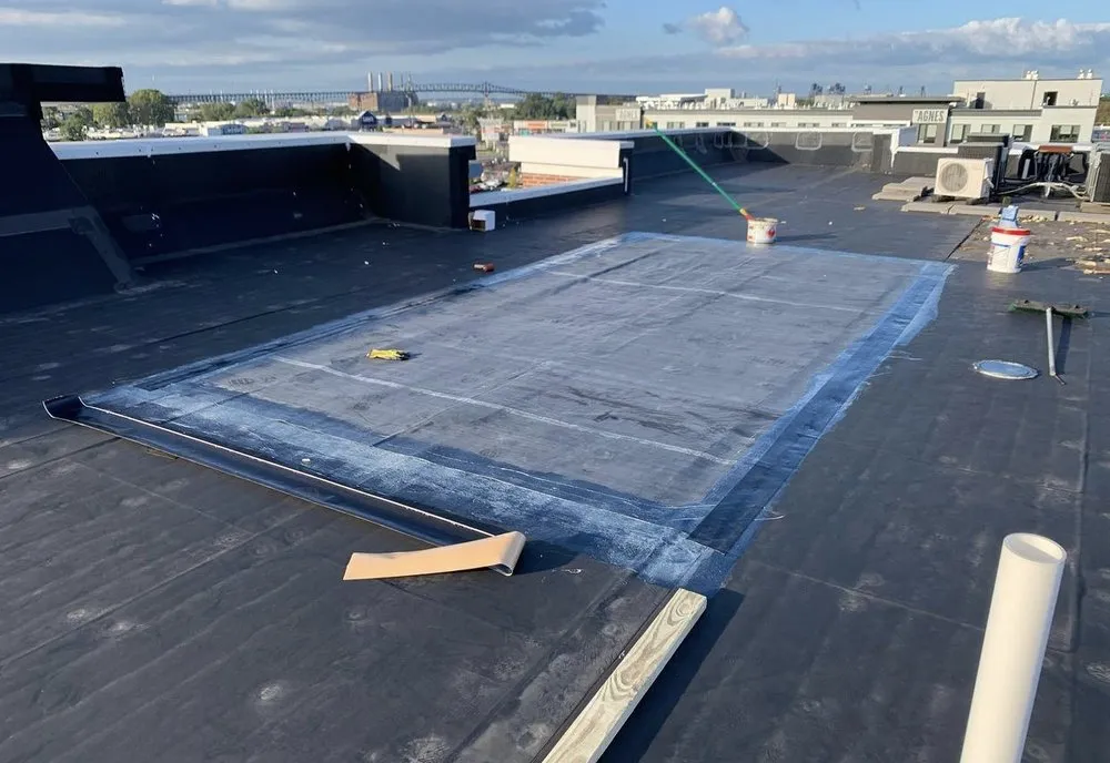 Slide of Eley’s Roofing