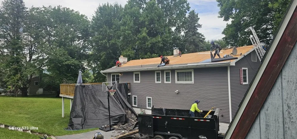 Slide of Elf Roofing and Siding