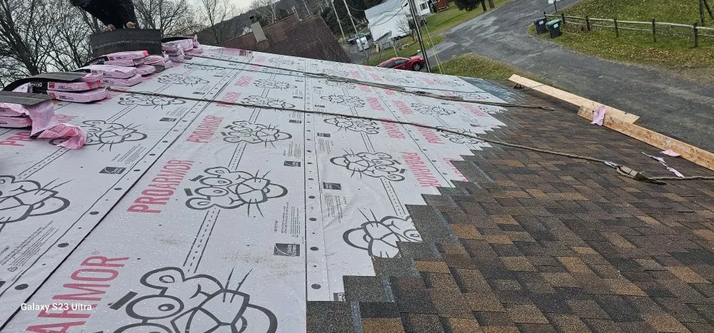 Slide of Elf Roofing and Siding