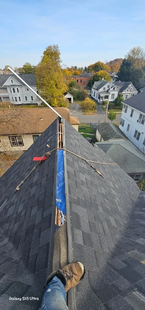 Slide of Elf Roofing and Siding