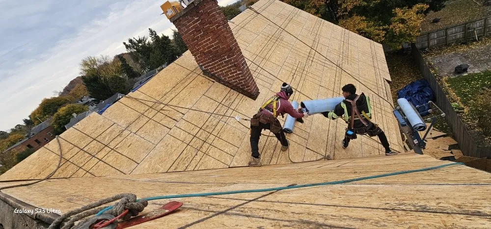 Slide of Elf Roofing and Siding
