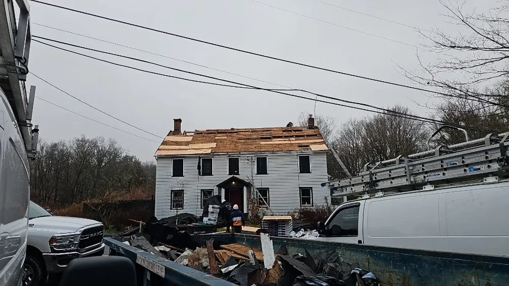 Slide of Elf Roofing and Siding