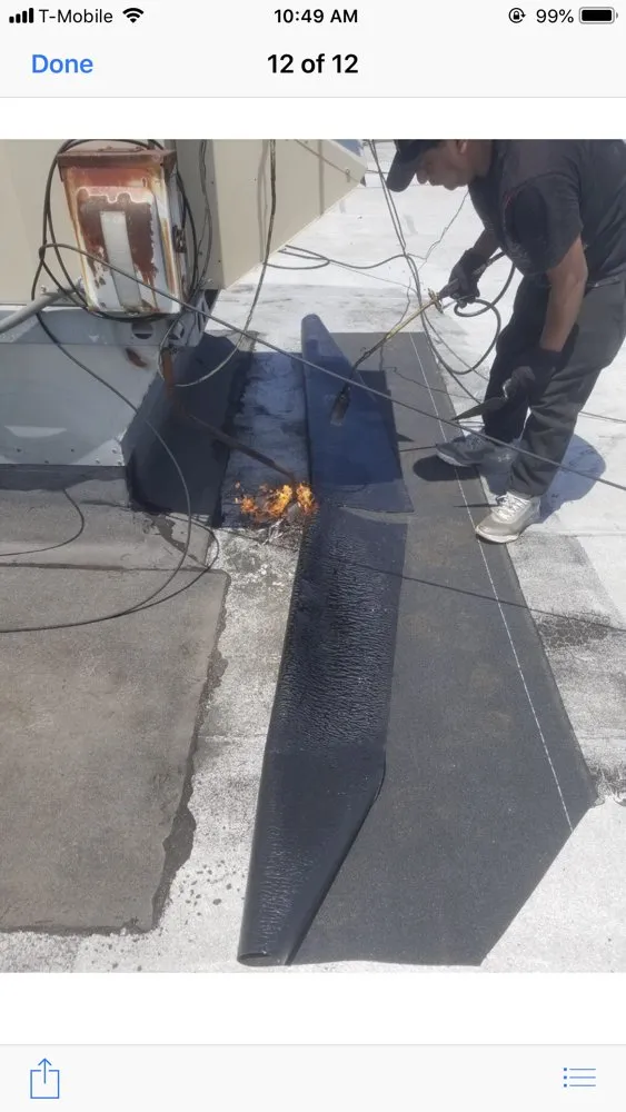 Slide of Eli & Sons Roofing