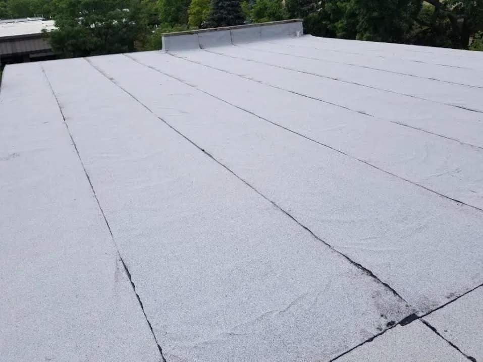 Slide of Eli & Sons Roofing