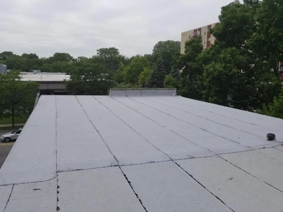 Slide of Eli & Sons Roofing