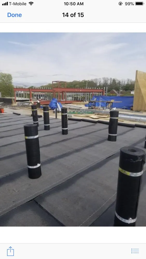 Slide of Eli & Sons Roofing