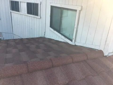 Slide of Eli Roofing