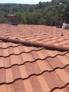 Slide of Eli Roofing