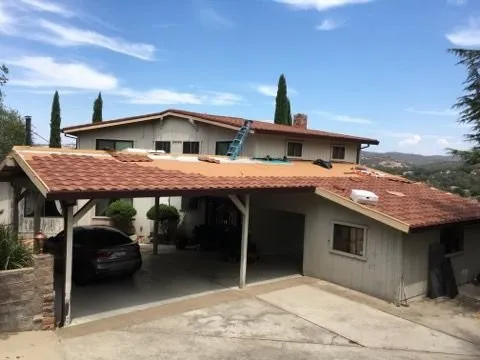 Slide of Eli Roofing