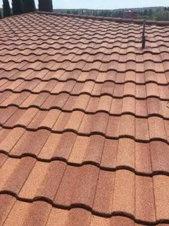 Slide of Eli Roofing