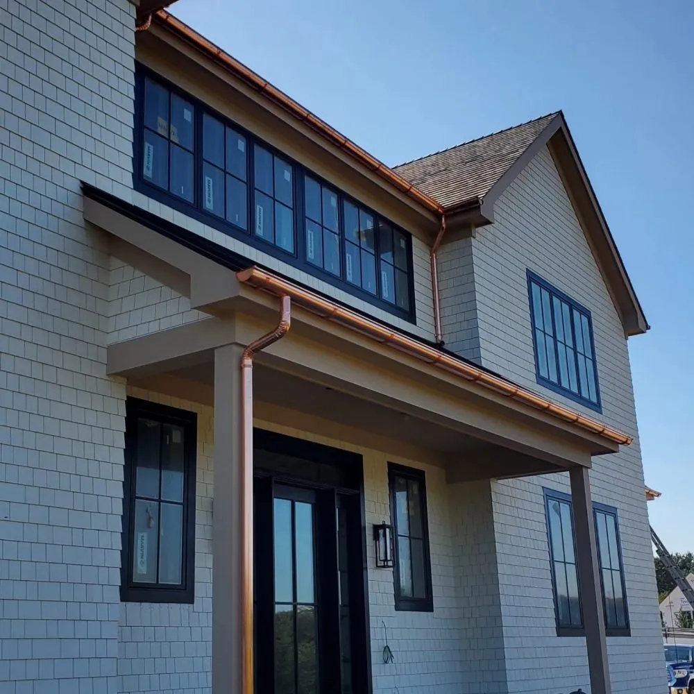 Slide of Eli Seamless Gutters