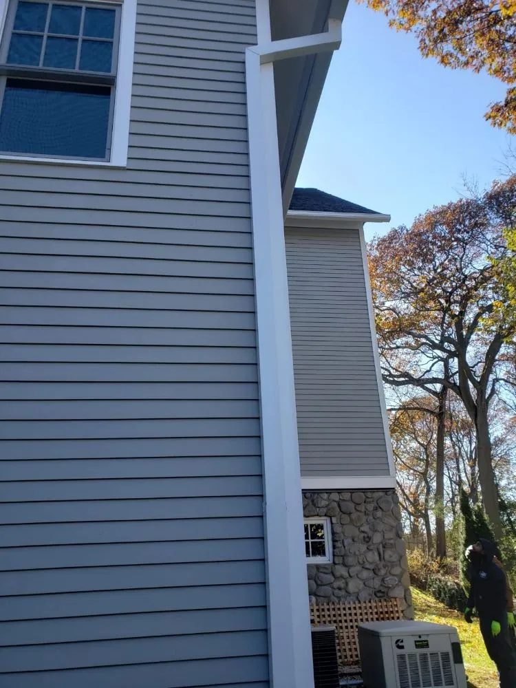 Slide of Eli Seamless Gutters