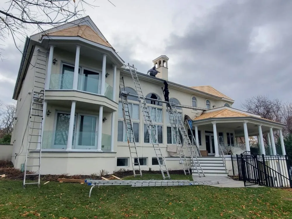 Slide of Eli Seamless Gutters