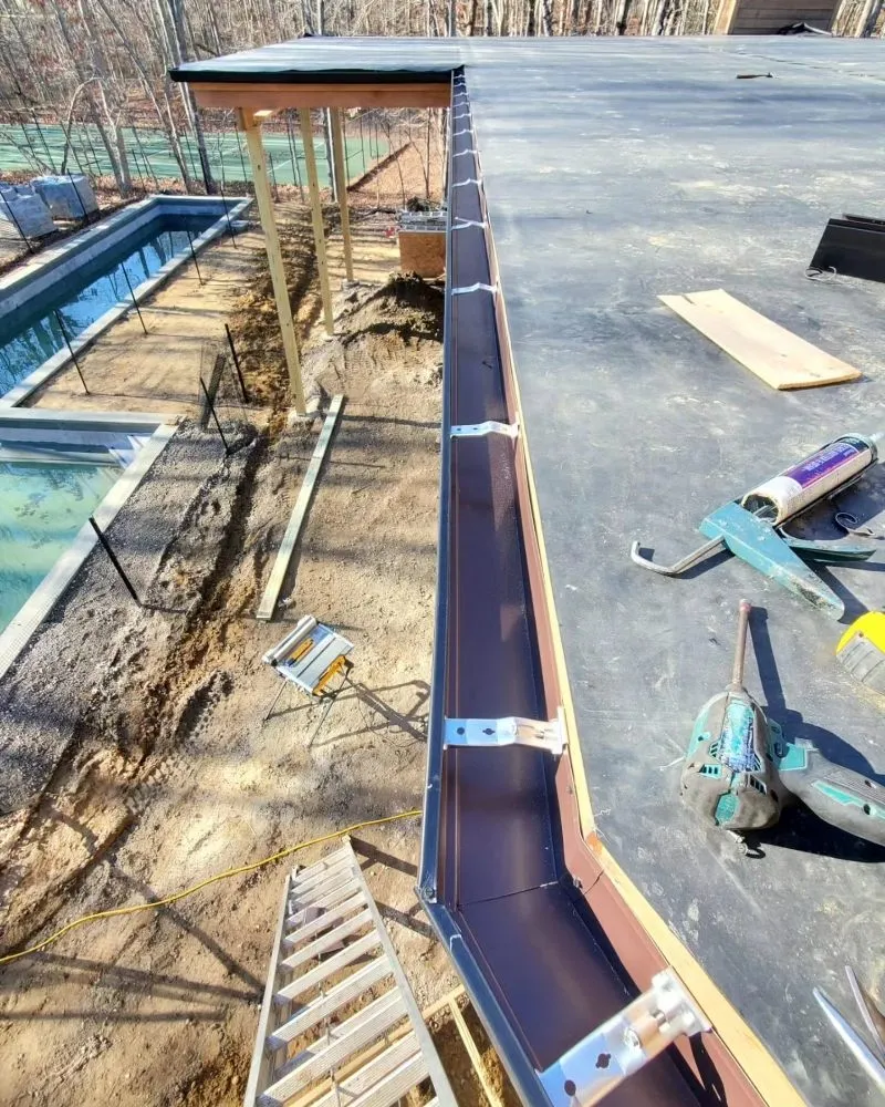 Slide of Eli Seamless Gutters