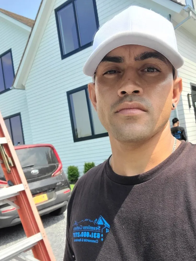 Slide of Eli Seamless Gutters