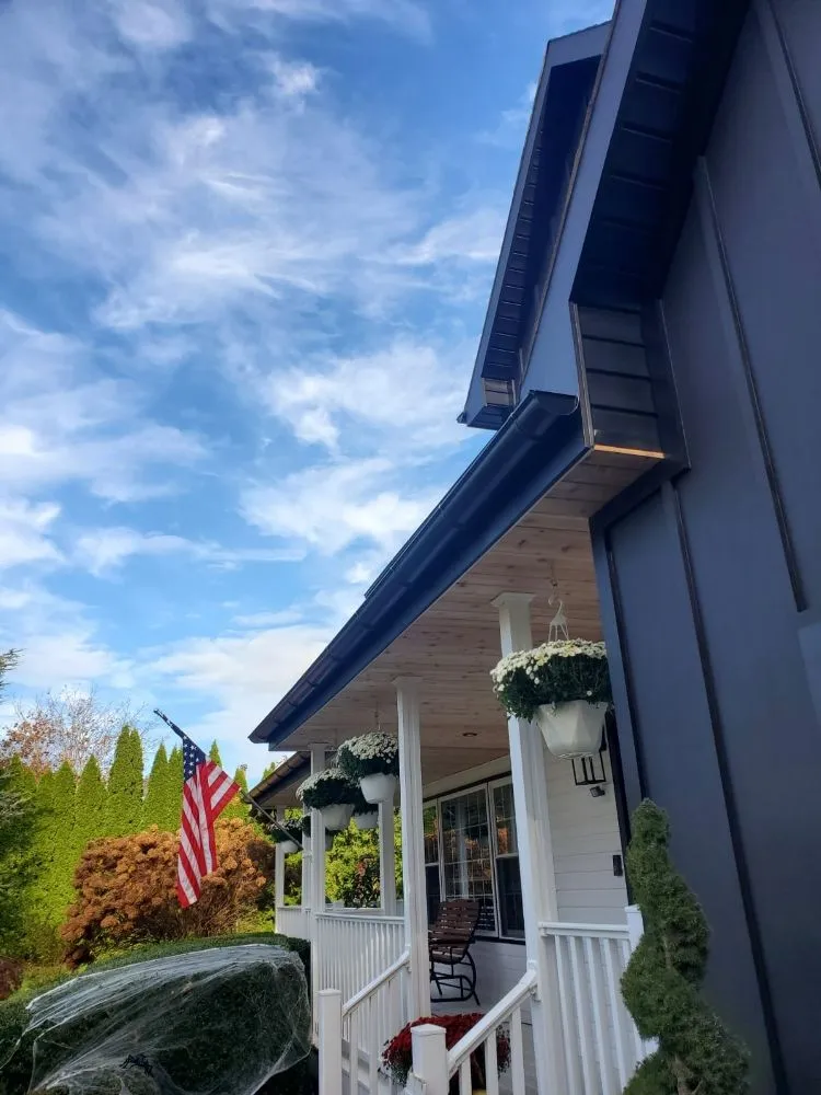 Slide of Eli Seamless Gutters