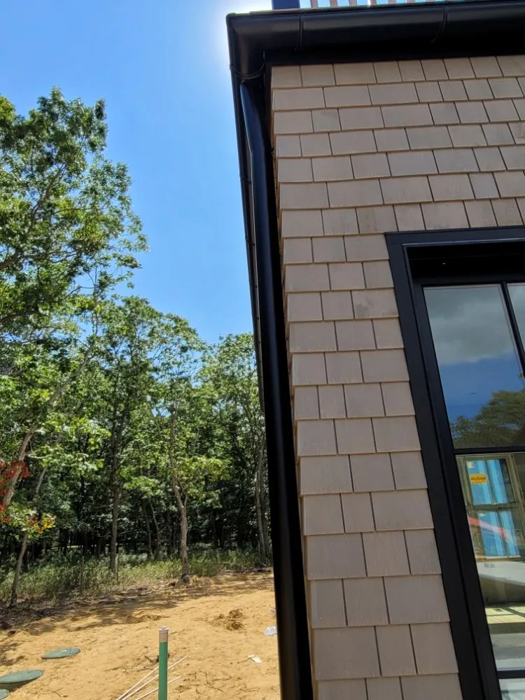 Slide of Eli Seamless Gutters