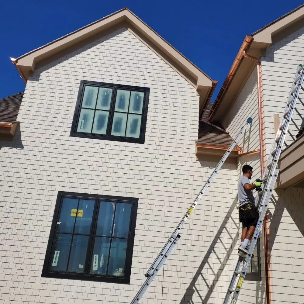 Slide of Eli Seamless Gutters