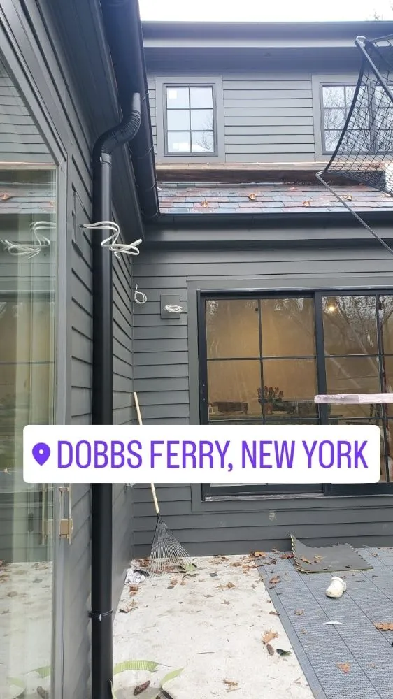 Slide of Eli Seamless Gutters