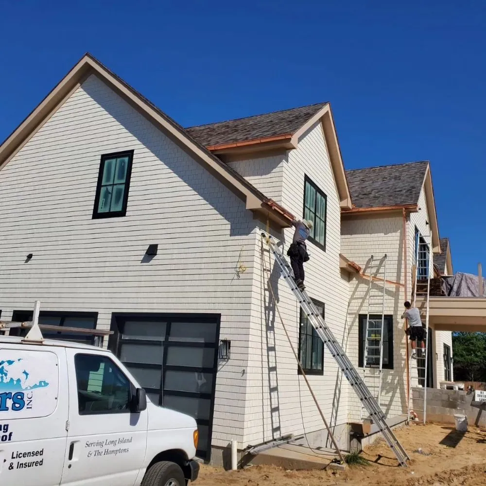 Slide of Eli Seamless Gutters