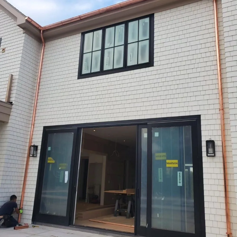 Slide of Eli Seamless Gutters