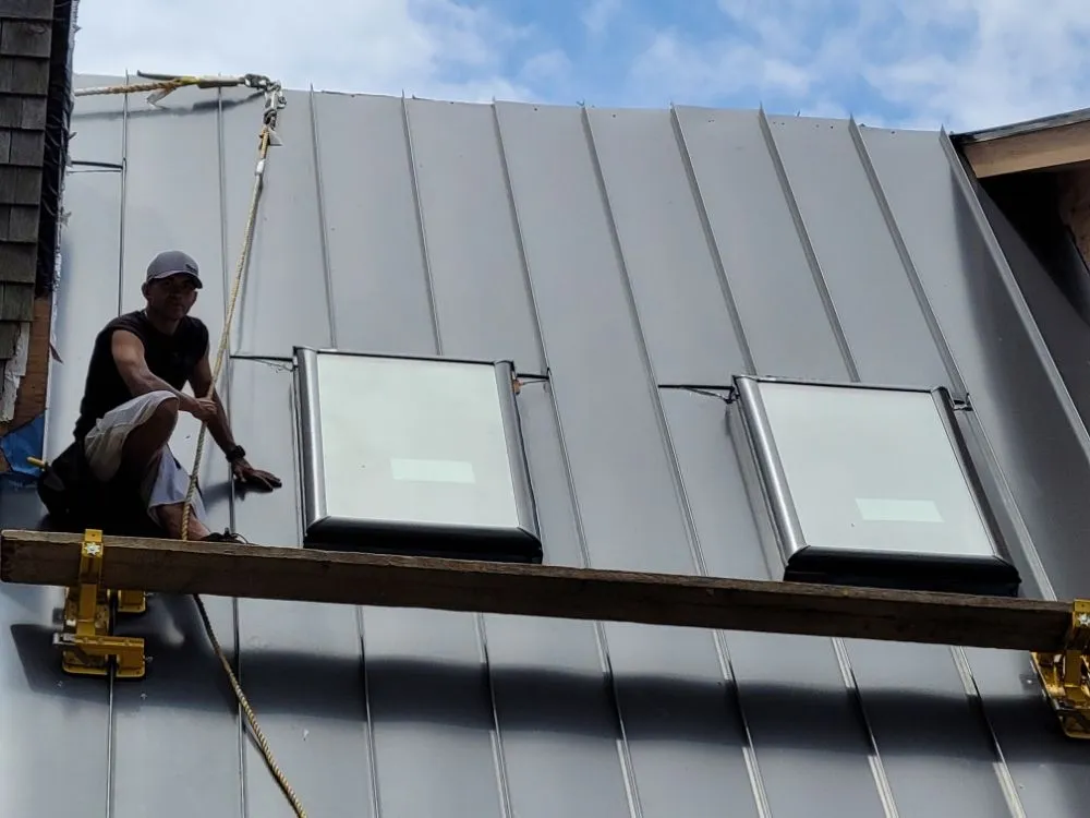 Slide of Eli Seamless Gutters