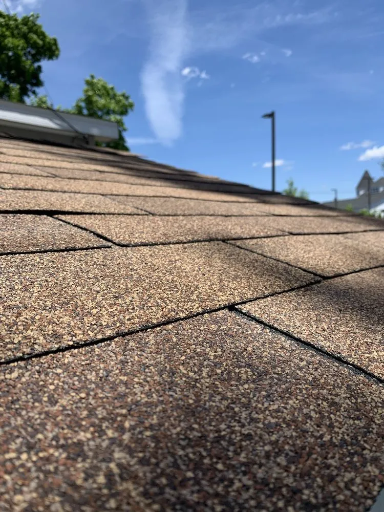 Slide of Eli's Roofing