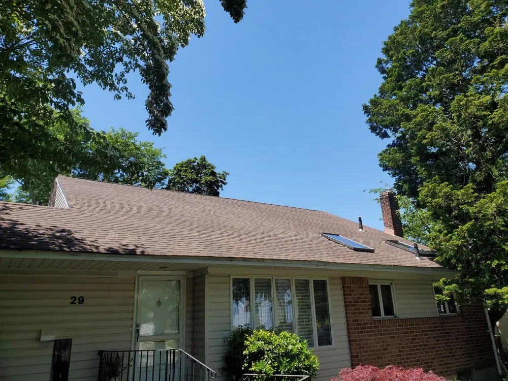 Slide of Elite Level Roofing