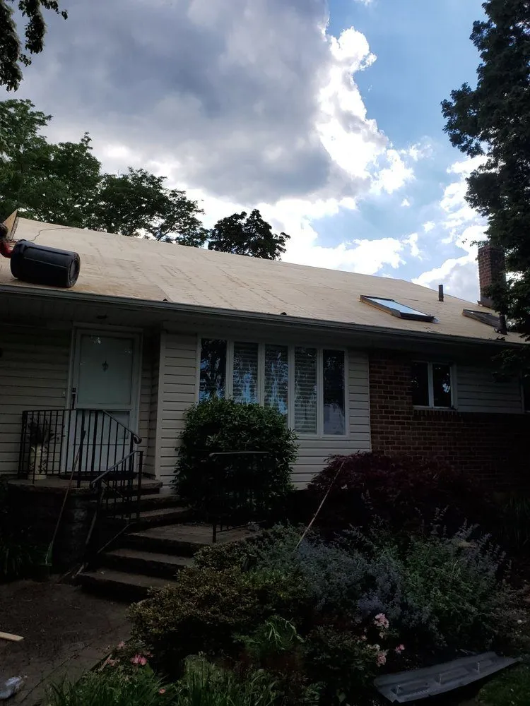 Slide of Elite Level Roofing